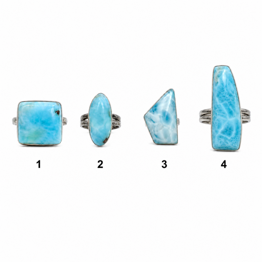 Quatre bagues réglables en Larimar de République Dominicaine montées sur argent 925